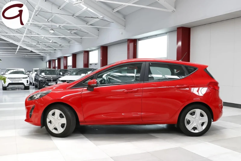 Lateral de Ford Fiesta rojo en venta